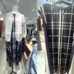 ネイビー地にホワイトのチェック柄が入った半袖ワンピース