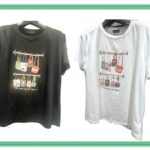 バッグモチーフのジルコンデザインが施されたブラックとホワイトのTシャツ