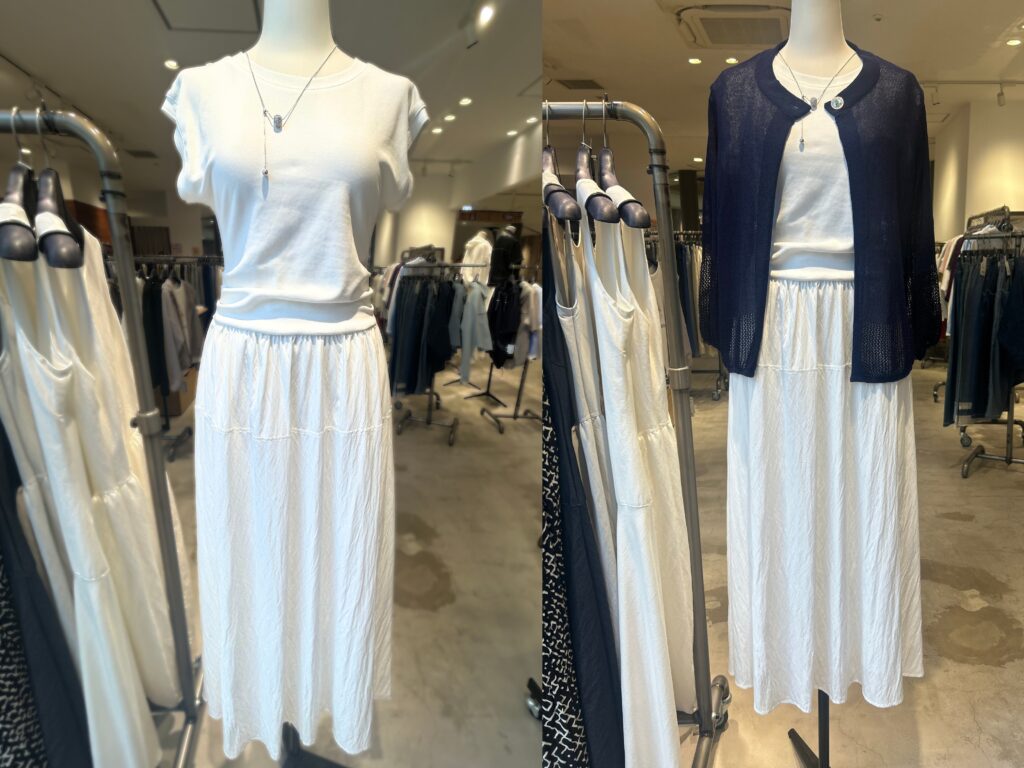 上品なフレンチ袖のワンピースとネイビーのカーディガンを合わせたコーディネート