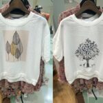 左：葉のイラストがプリントされた白の綿ガーゼTシャツ 右：木のイラストがプリントされた白の綿ガーゼTシャツ