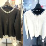 ブラックとホワイトの2色展開、配色ラインがポイントのダブルジップニットカーディガン
